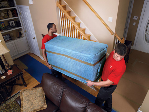 All furniture is protected with heavy duty moving pads