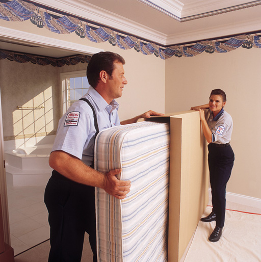 Mattresses and box springs are then packing into sanitary cardboard boxes