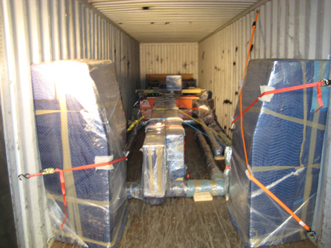 Packing art exhibit for transport to Europe