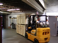 Moving exhibit and display crates from our trucks and into our warehouse