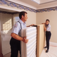 Packing a mattress into a sanitarty mattress carton