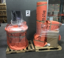 Pad-wrapped medical machinery at our warehouse ready to be loaded on an Avatar Relocation truck