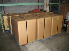 Triwall containers which have been packed and are ready to be shipped via air freight carrier
