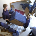 Moving a dresser down a stairway